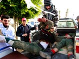 Мисурата, раненные правительственные солдаты доставлены в местный госпиталь, 23 апреля 2011 года