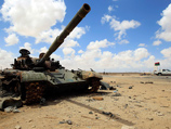 Итальянские бойцы разыскивают замаскированные танки и ракетные установки сил Муаммара Каддафи