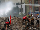 Один человек погиб и десять получили ранения в результате обстрела йеменскими силовиками демонстрантов в Таизе