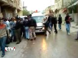 В Сирии военные расстреливают из танков жилые кварталы. СМИ: жена президента сбежала В Сирии военные расстреливают из танков жилые кварталы. СМИ: жена президента сбежала