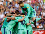 Каталонская "Барселона" выиграла чемпионат Испании по футболу в третий раз подряд и в 21-й в своей истории