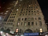 Доминик Стросс-Кан прибыл в пятницу вечером в дом по адресу 71 Broadway в нижнем Манхэттене