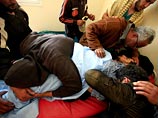 Телевидение Ливии сообщило о том, что в результате бомбардировки в ночь на субботу погибли люди. Точное количества жертв названо не было