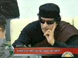 Каддафи сыграл в шахматы с Илюмжиновым и заявил, что никогда не покинет Ливию (ВИДЕО)
