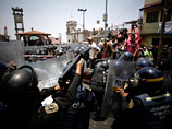 В Мексике полиция спасла грабителей винного магазина от народного гнева: пострадали 11 полицейских