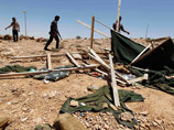 Силы НАТО разбомбили автобус в Ливии, 12 погибших. Конгрессмены подали на Обаму в суд