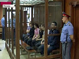 На скамье подсудимых - шесть уроженцев Северного Кавказа: четверо из Дагестана, один из Чечни и один из Кабардино-Балкарии. Последний, 27-летний Аслан Черкесов, обвиняется непосредственно в убийстве На скамье подсудимых - шесть уроженцев Северного Кавказа: четверо из Дагестана, один из Чечни и один из Кабардино-Балкарии. Последний, 27-летний Аслан Черкесов, обвиняется непосредственно в убийстве