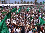 Говоря о будущем Ливии, российский представитель высказал мнение, что "ситуацию вполне по силам урегулировать без полковника Каддафи"