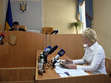 Суд над Тимошенко: депутаты подрались с милицией, а экс-премьер снимала это на мобильник