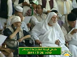 Ливийский террорист Абдель Басит аль-Миграхи (на фото слева), известный как "локербийский бомбист", внезапно появился на государственном телевидении Ливии