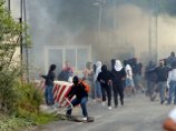 В результате вспышки насилия в Косове сожжен пограничный КПП, атакована база НАТО