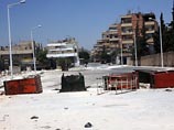 Последствия столкновений армии и манифестантов в сирийском городе Хама
