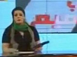 По словам решительно настроенной женщины, продемонстрировавшей зрителям оружие, служащие телеканала будут обороняться от противников ливийского лидера Муамара Каддафи до последней возможности