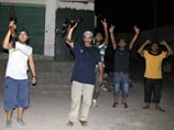 Ливийские повстанцы устроили торжество на Зеленой площади в ознаменование захвата Триполи Ливийские повстанцы устроили торжество на Зеленой площади в ознаменование захвата Триполи