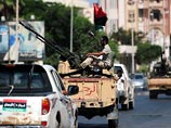 Ливийские повстанцы готовятся атаковать оплот сил Каддафи в пустыне