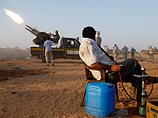 Войска ливийских повстанцев с боем прорвались в родной город Каддафи - их встретили шквальным огнем
