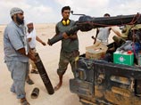 Ливийские повстанцы не взяли оплот Каддафи. Его сторонники выступили с заявлениями