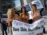 Одна из акций PETA в Торонто Одна из акций PETA в Торонто