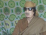 Беглый лидер Ливии Муаммар Каддафи спрятался в пустыне на юго-западе страны, в районе границы с Нигером и Алжиром, сообщил в понедельник представитель племени туарегов в Национальном переходном совете (НПС) Мусса аль-Коун