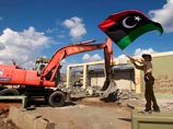 Новые ливийские власти начали "праздничный снос" резиденции Каддафи