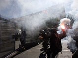 На улицы Афин вышли более 100 тысяч человек, произошли беспорядки. Центр города в дыму и обломках
