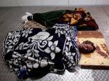 Тела Муатассима Каддафи и Муаммара Каддафи, Мисрата, 22 октября Тела Муатассима Каддафи и Муаммара Каддафи, Мисрата, 22 октября