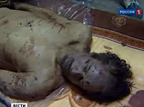 Власти перестали пускать глазеющих в морг, где лежит Каддафи: тело начало разлагаться