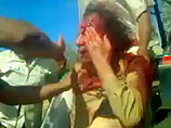 СМИ раскрывают все более жуткие подробности последних минут ливийского лидера Муаммара Каддафи перед смертью