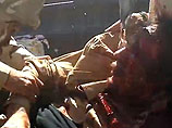 СМИ: линчеватели перед смертью подвергли Каддафи жестокому извращенному насилию, показывает видео