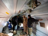 Сейф аль-Ислам Каддафи в самолете, Зинтан, 19 ноября 2011 года