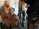 Вооруженная группа сторонников новых властей Ливии, которая арестовала накануне Сейфа аль-Ислама, в воскресенье заявила, что намерена удерживать пленника в своих руках, пока в стране не будет сформирована новая судебная система