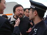 Речь идет о массовой акции поддержки известного китайского художника Ай Вэйвэя, преследуемого властями КНР Речь идет о массовой акции поддержки известного китайского художника Ай Вэйвэя, преследуемого властями КНР