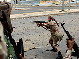 В ливийском городе Бени-Валид произошли боевые столкновения между сторонниками свергнутого и убитого лидера страны Муаммара Каддафи и силами Переходного национального совета (ПНС)