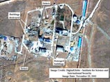В понедельник же вашингтонский Институт науки и международной безопасности (ISIS) опубликовал на своем сайте спутниковый снимок, на котором видны последствия взрыва на иранской базе. Места разрушений и завалов указаны стрелочками. Снимок был сделан 22 ноя В понедельник же вашингтонский Институт науки и международной безопасности (ISIS) опубликовал на своем сайте спутниковый снимок, на котором видны последствия взрыва на иранской базе. Места разрушений и завалов указаны стрелочками. Снимок был сделан 22 ноя