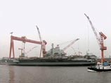 Первый в КНР авианосец был построен на базе советского тяжелого авианесущего крейсера "Варяг", в 1992 году при 70% готовности строительство было остановлено. В 1998 году он был выкуплен у Украины по цене металлолома Первый в КНР авианосец был построен на базе советского тяжелого авианесущего крейсера "Варяг", в 1992 году при 70% готовности строительство было остановлено. В 1998 году он был выкуплен у Украины по цене металлолома