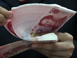 Эксперты предрекают китайскому юаню стабильность в будущем году