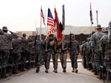 Торжественная церемония состоялась на военной базе под Багдадом, в ходе который был спущен американский флаг