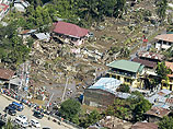 Число жертв шторма "Ваши", обрушившегося на юг Филиппин на минувшей неделе, и последовавших за ним наводнений и оползней достигло 957 человек