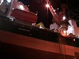 Тела еще двух погибших с затонувшей в Охотском море буровой платформы "Кольская" подняты на борт спасательного судна "Алтас"