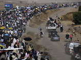 Вооруженные сторонники оппозиции направляются в столицу Йемена, 23 декабря 2011 года