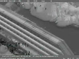 Обнародовано видео эвакуации пассажиров с тонущего круизного лайнера Costa Concordia, сделанное сотрудниками береговой охраны Италии с вертолета инфракрасной камерой ночного видения