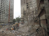 По последним данным, 15 человек погибли в результате обрушения трех офисных зданий в центральной части города Рио-де-Жанейро
