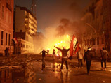 В столкновениях демонстрантов с полицией в Каире в ночь на пятницу пострадали более 600 человек