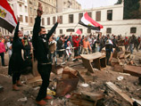Десятки тысяч жителей Египта в составе трех колонн движутся на центральную площадь египетской столицы Тахрир после дневной молитвы в пятницу