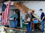 Число жертв торнадо, обрушившегося на американские штаты Индиана, Кентукки и Огайо, возросло до 31 человека