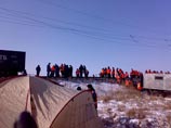Столкновение двух поездов на Транссибе: с рельсов сошли два десятка вагонов (ФОТО) Столкновение двух поездов на Транссибе: с рельсов сошли два десятка вагонов (ФОТО)