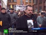В шествии принимали участие приблизительно 1500-2000 человек. Они пели патриотические песни, в руках они несли плакаты с лозунгами протеста против оккупационных режимов, а затем возложили цветы к памятнику Свободы В шествии принимали участие приблизительно 1500-2000 человек. Они пели патриотические песни, в руках они несли плакаты с лозунгами протеста против оккупационных режимов, а затем возложили цветы к памятнику Свободы