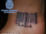 В Испании банда сутенеров сделала 19-летней секс-рабыне татуировку в виде штрих-кода В Испании банда сутенеров сделала 19-летней секс-рабыне татуировку в виде штрих-кода