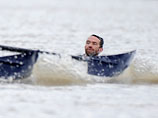 Полиция предьявила обвинения пловцу-активисту, помешавшему проведению гонки на Темзе