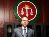 О том, что судебный процесс над сыном бывшего диктатора, подозреваемом в убийствах, насилии и финансовых махинациях, пройдет в Ливии, сообщил министр юстиции страны Али Ашур